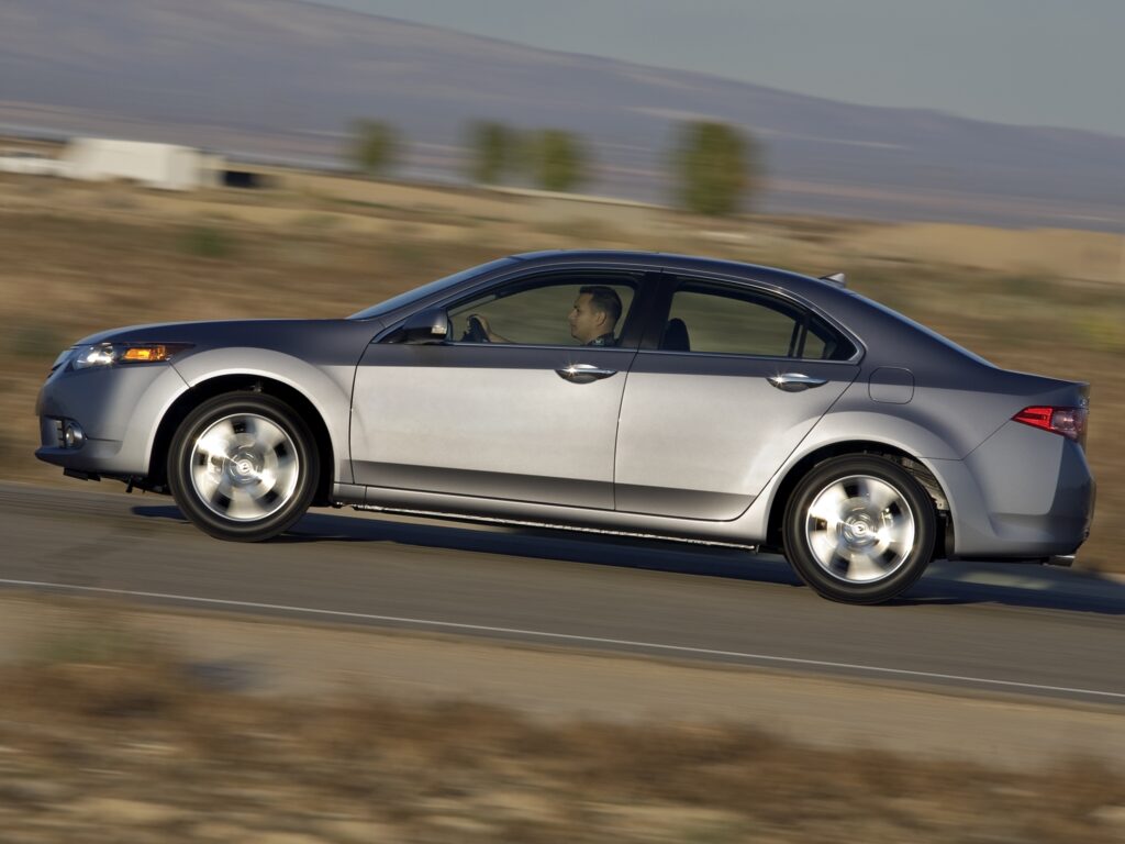 Sleek Metallic Gray 2010 Acura TSX Wallpaper on Open Road