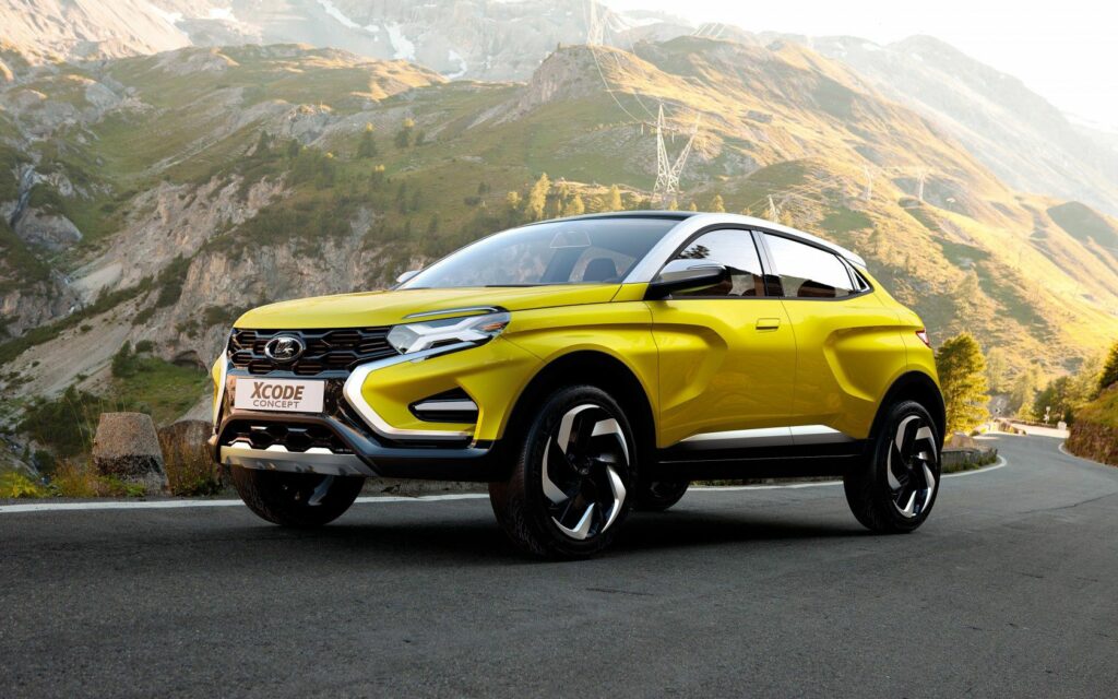 Stunning 2016 Lada Xcode: Yellow Concept Car Wallpaper with Mountains