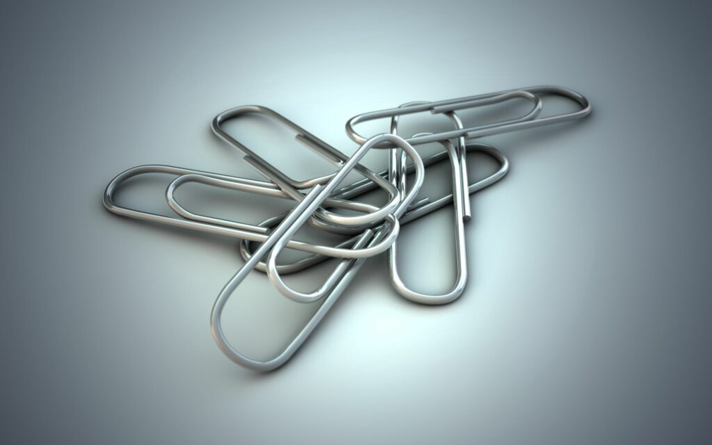 Metallic Paper Clips on Gradient Background - 2560x1600 Wallpaper