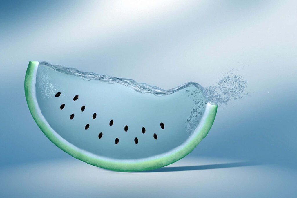 Stunning 3D Watermelon Slice Wallpaper with Refreshing Water Splash