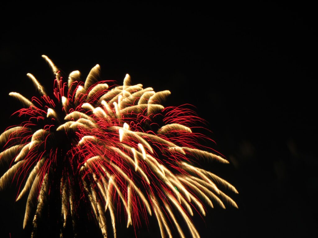 Stunning 4000x3000 Fireworks Wallpaper: Red & Gold on Black Sky