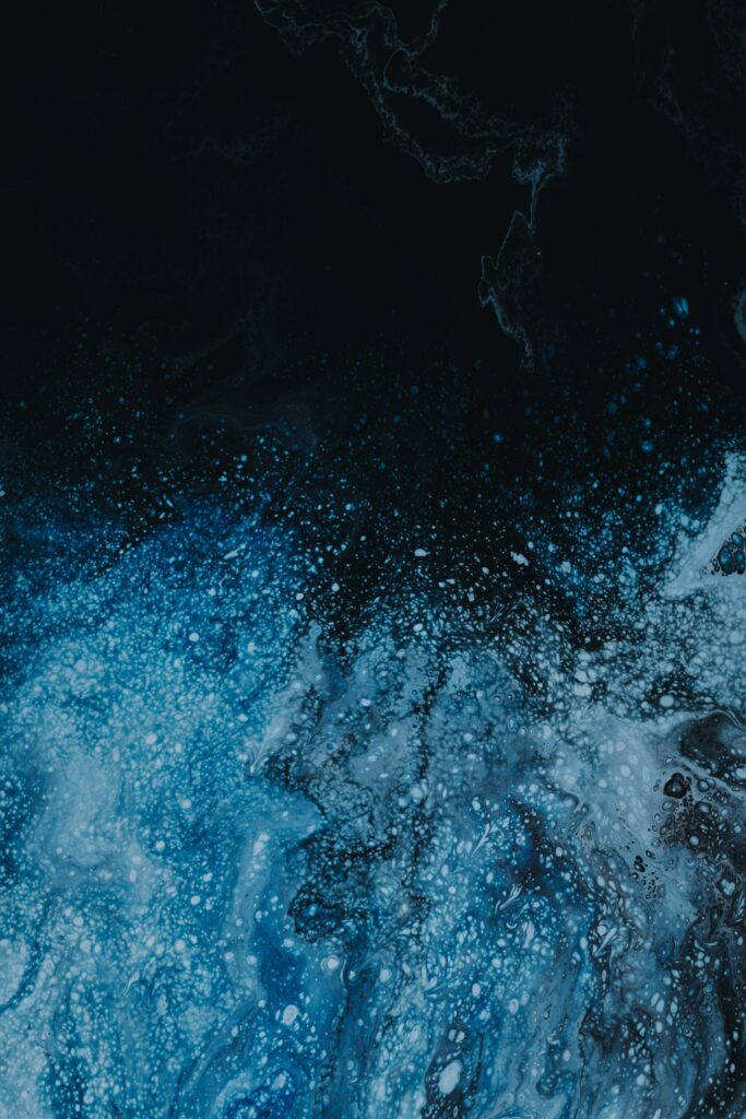 Abstract Blue Hues Wallpaper: Dynamic Textured Digital Art Background