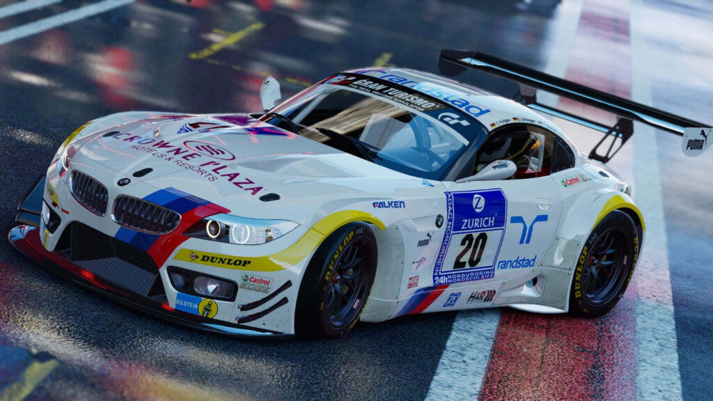 White BMW Z4 GT3 E89 racing car with vibrant decals on wet track 4K wallpaper background