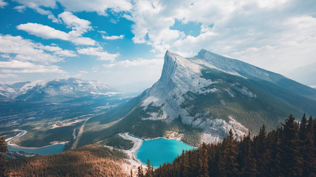 Mount Ha Ling towering over turquoise glacial lake in Canadian Rockies 4K UHD wallpaper