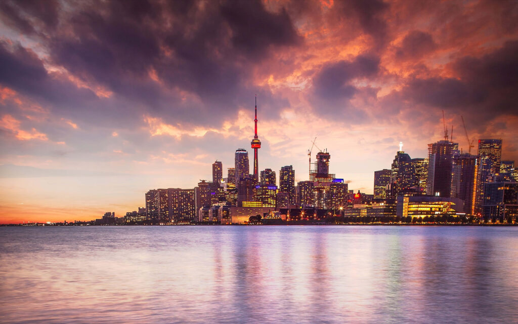 Vibrant City Skyline Dusk 4K Wallpaper: Illuminated Reflection