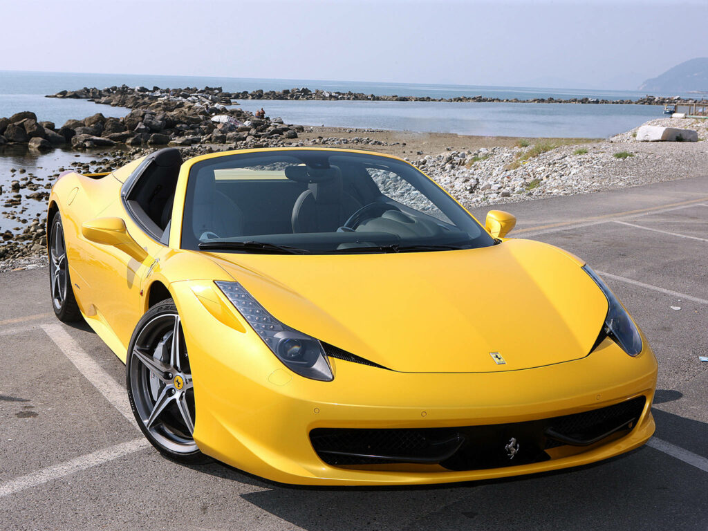 Dazzling Yellow Ferrari 458 Spider 2014 Model: Striking Frontal View With Charming Port Backdrop Wallpaper