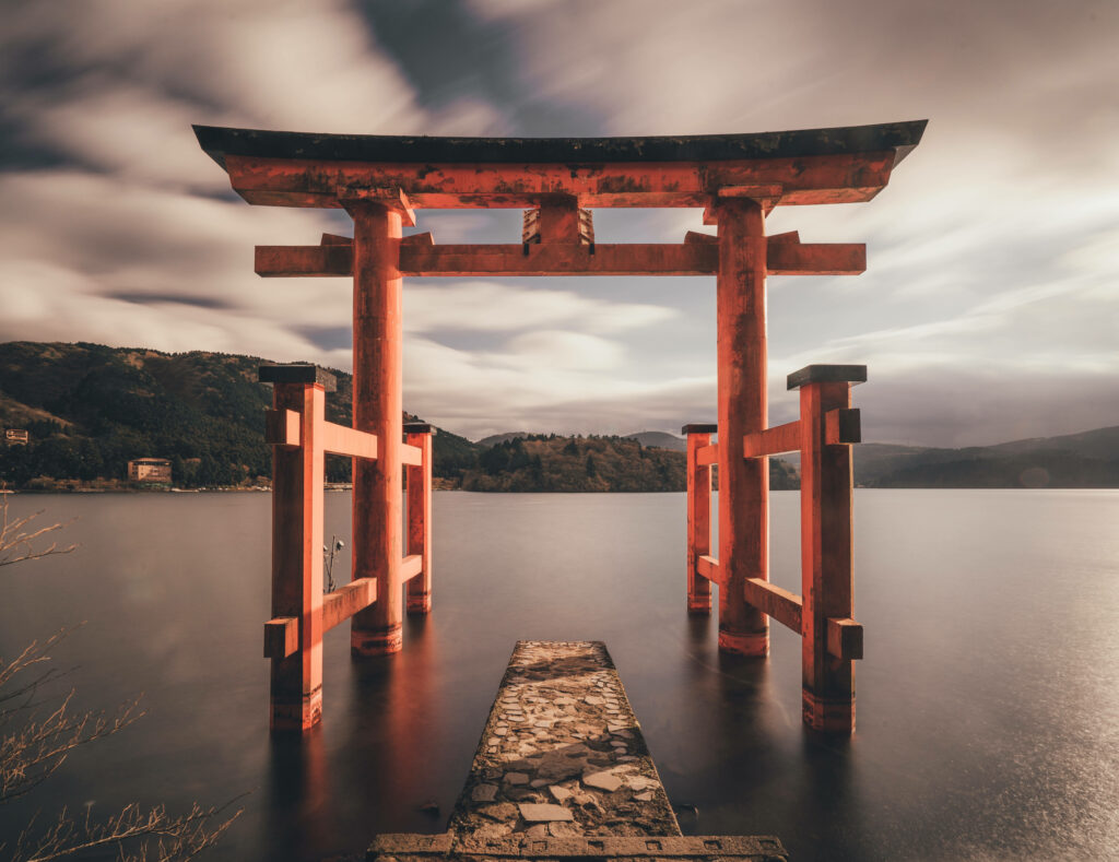 Stunning 4K Japanese Torii Gate Wallpaper: Tranquil Mountains & Sky