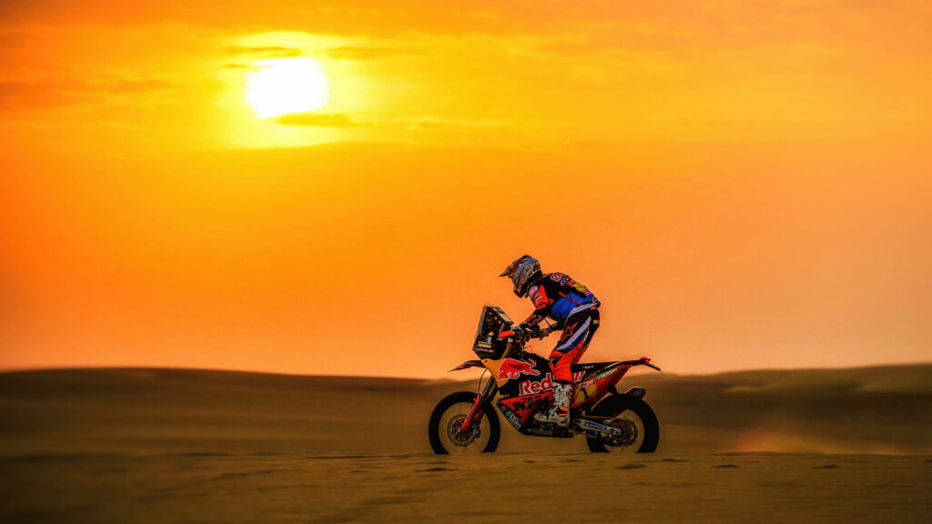 Vibrant 4K KTM Bike Wallpaper: Speeding Through Sunset Sands