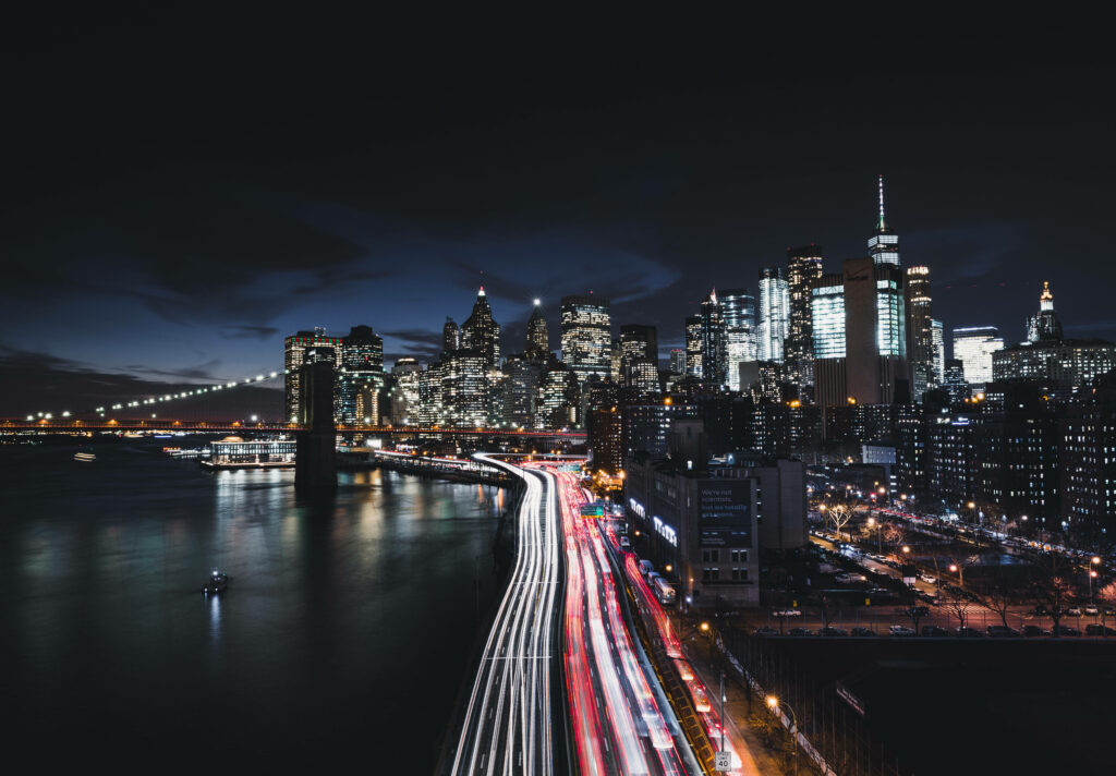 Stunning 4K Manhattan Night Wallpaper: Busy Road & Brooklyn Bridge