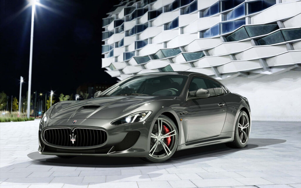 Stunning 4K Maserati Wallpaper: Luxurious Sports Car at Night