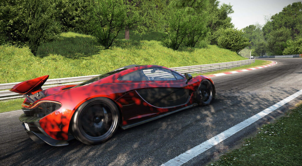 Red McLaren P1 racing on tree-lined scenic track vibrant greenery dynamic lighting 4K wallpaper