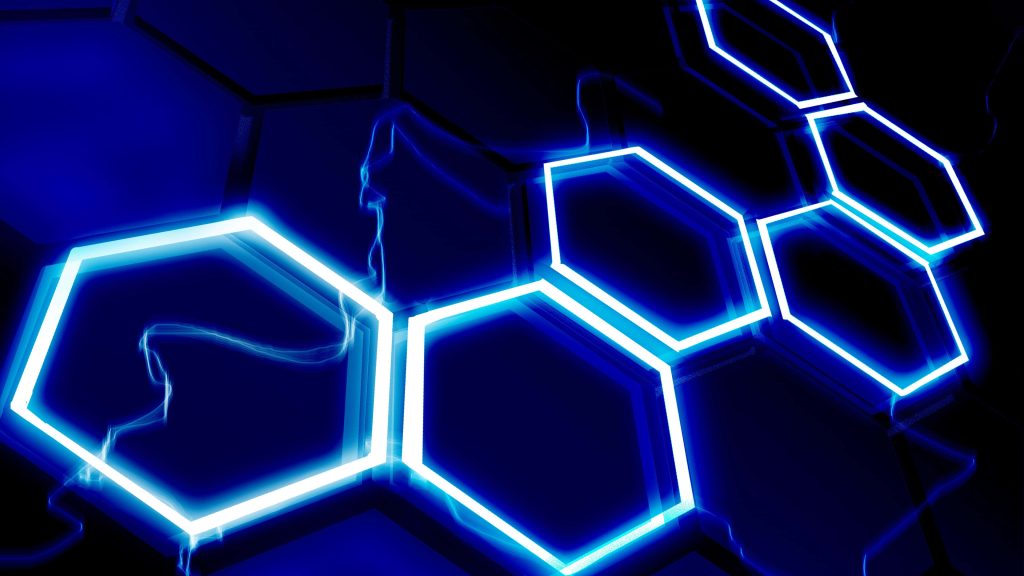 4K hexagon wallpaper with glowing neon blue honeycomb pattern on dark futuristic background