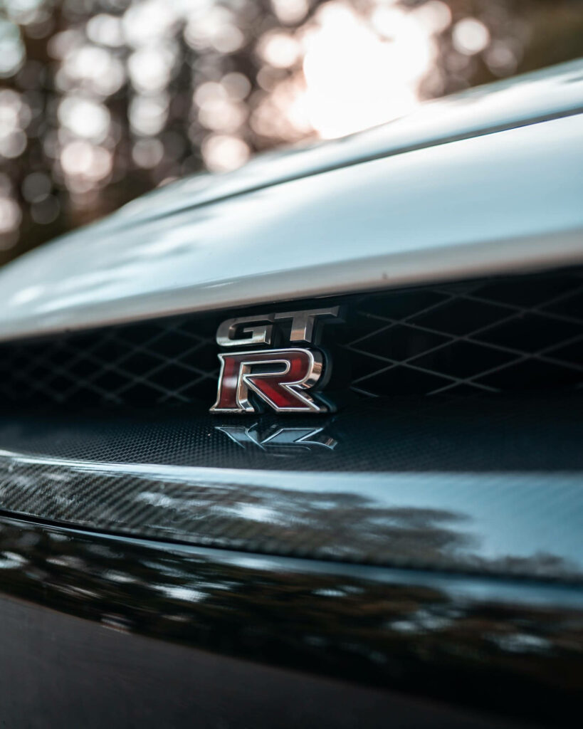 Stunning Nissan GT-R 4K Wallpaper with Grille & Forest Background