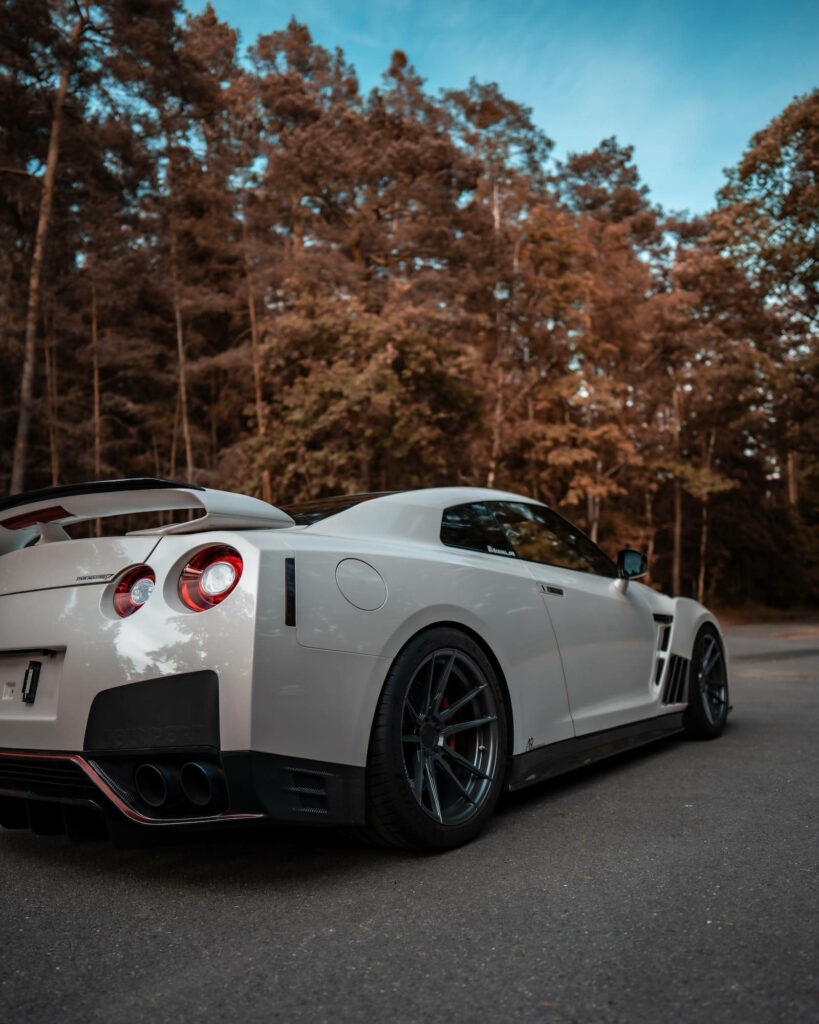 Stunning 4K Nissan GT-R Wallpaper: Scenic Outdoor Backdrop