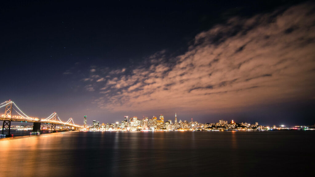 Radiant San Francisco Skyline 4K Wallpaper: Bay Bridge at Night