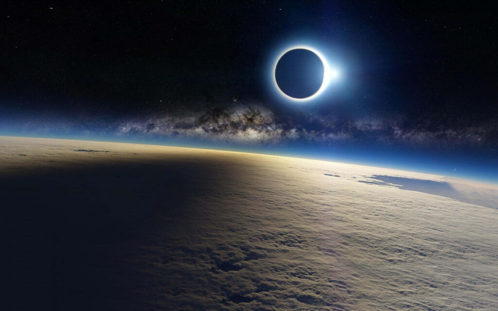 Stunning 4K Solar Eclipse Wallpaper: Radiant Corona & Earth Below