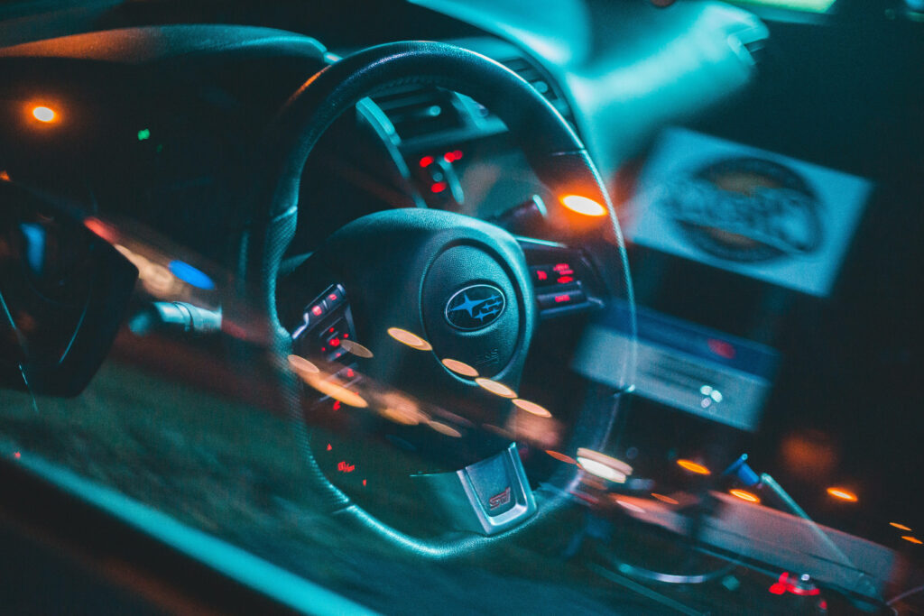 Stunning 4K Subaru WRX STI Wallpaper: Sporty Interior & Vibrant Lighting