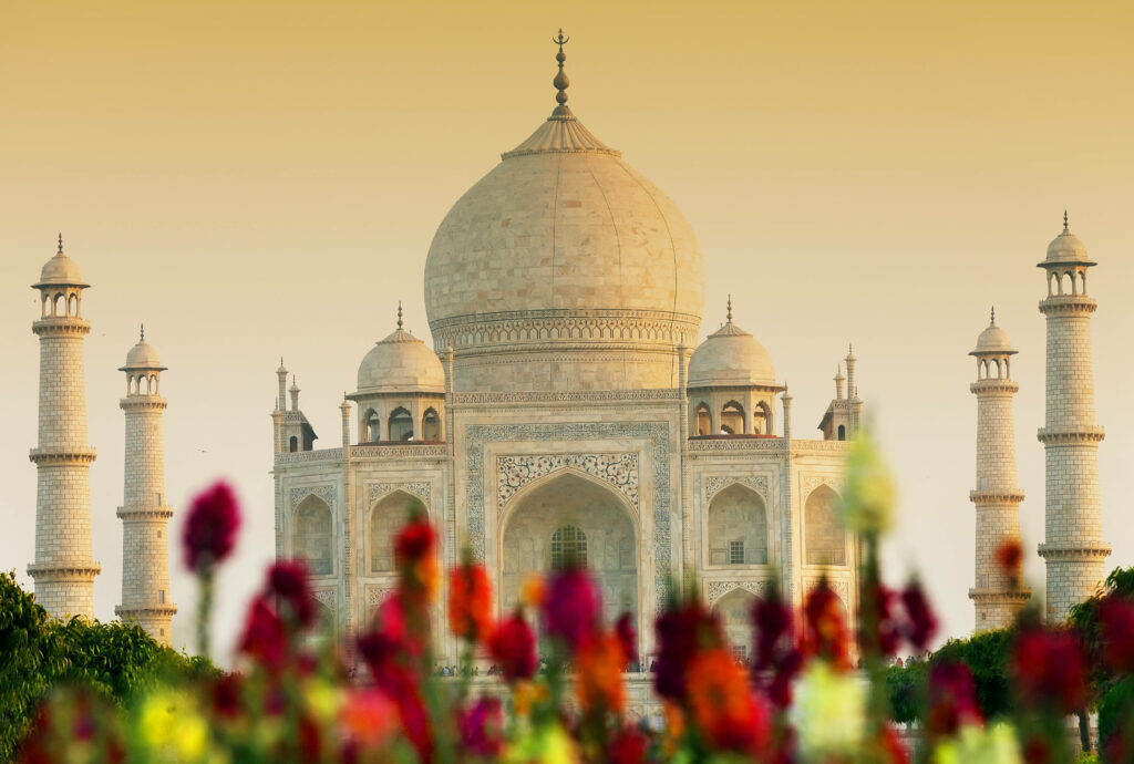 Stunning Taj Mahal 4K Wallpaper with Blooming Flowers Background