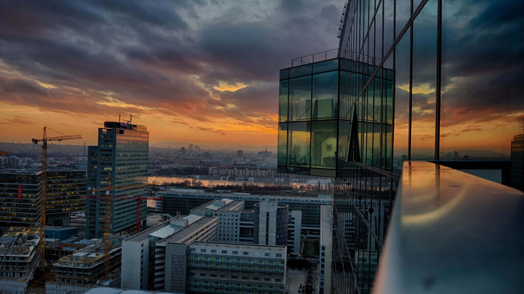 Stunning 4K Cityscape Twilight Wallpaper: Modern Architecture & Sunset