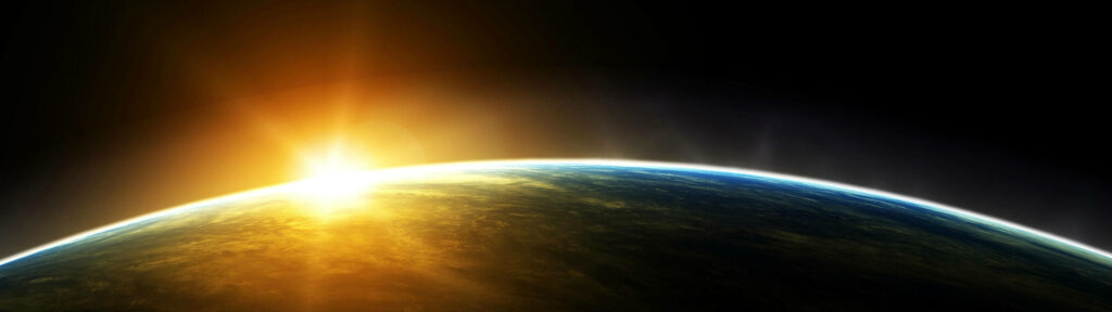 Stunning 4K Wallpaper: Earth's Surface at Sunrise in Space