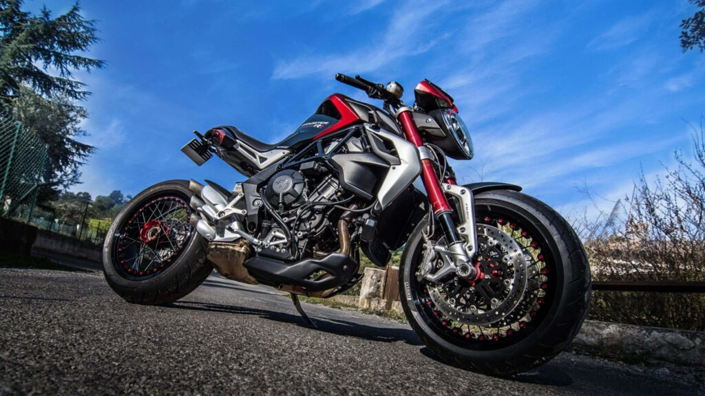 High-Performance Bike Wallpaper in Stunning 4K Against Blue Sky