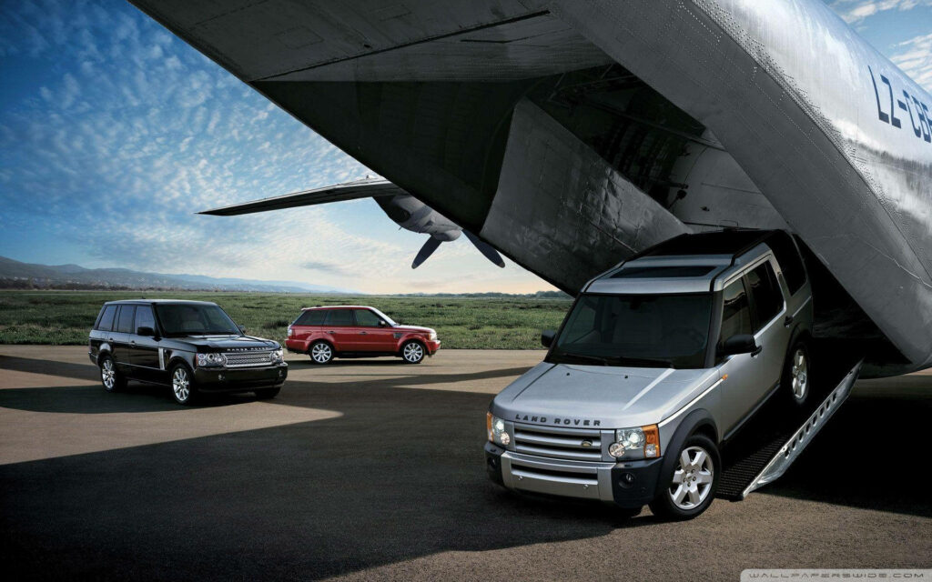 Stunning 4K Wallpaper: Range Rover Loading into Plane Adventure
