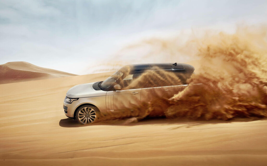 Stunning 4K Range Rover Wallpaper: Conquering Golden Desert Sands