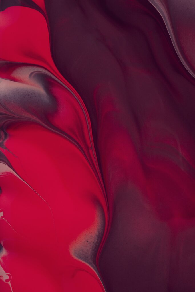 Vibrant Red Abstract Wallpaper: Fluid Paint Swirls & Dynamic Design