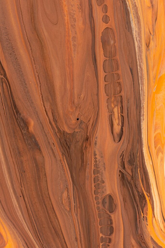 Stunning Abstract Wallpaper: Fluid Brown & Orange Paint Patterns