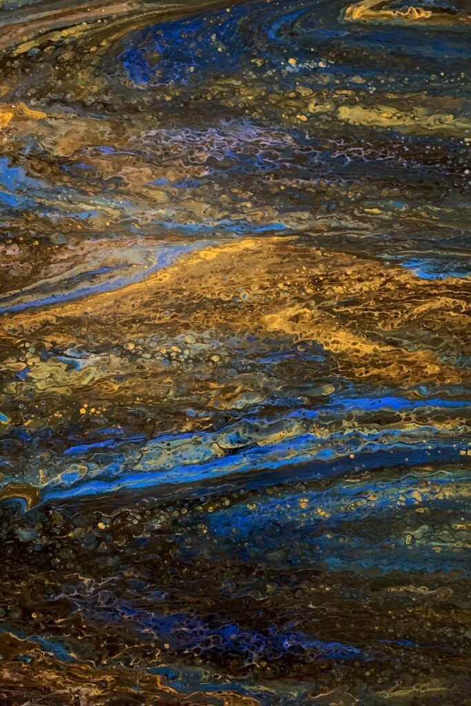 Mesmerizing Abstract Wallpaper: Swirling Blue & Gold Design