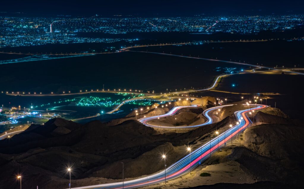 Stunning Abu Dhabi Night View Wallpaper with Dynamic Lights