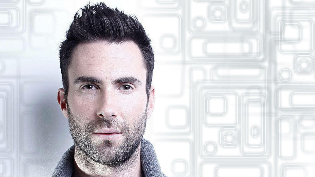 Adam Levine wallpaper with geometric patterns, showcasing his charismatic features and style.