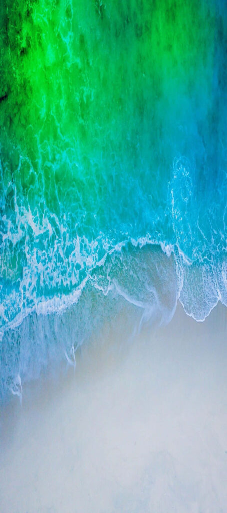 Stunning Aerial Beach View: Vibrant Waves & Minimalist iPhone Wallpaper
