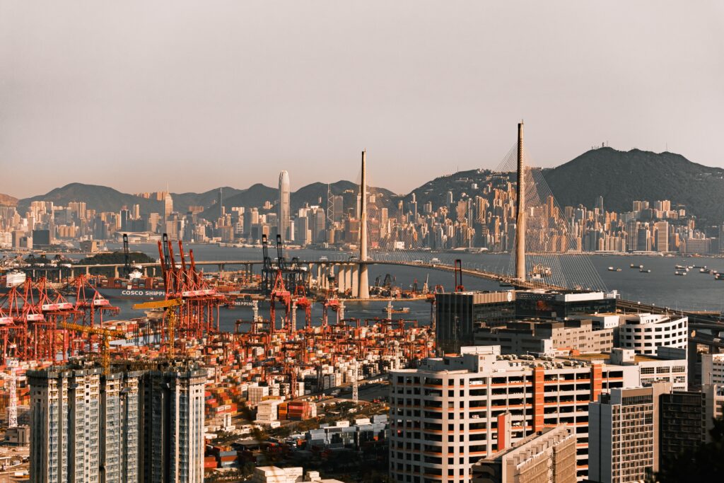 Aerial City Wallpaper: Stunning Architecture & Mountainous Landscape