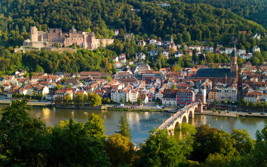 Stunning Cityscape Wallpaper: Historic Castle & Lush River View