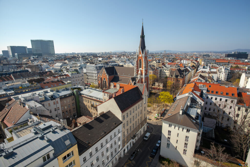 Vibrant Cityscape Wallpaper: Historic Meets Modern Architecture