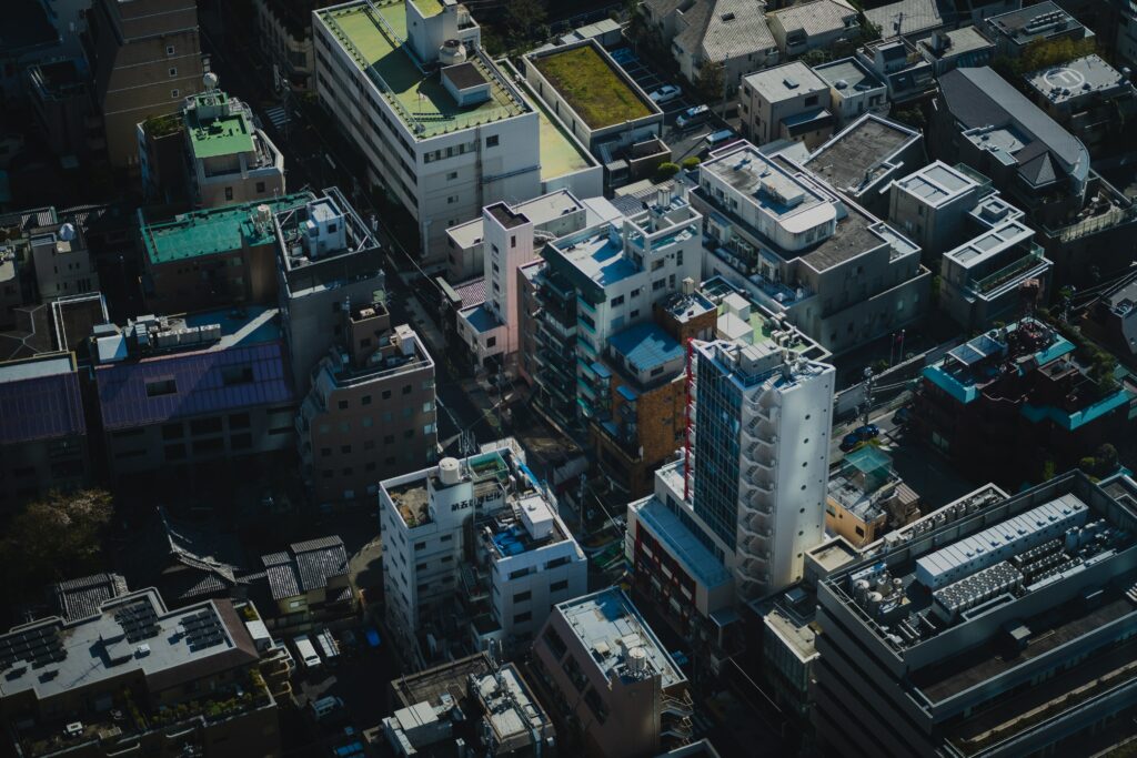 Urban Aerial View Wallpaper: Modern Cityscape & Geometric Design