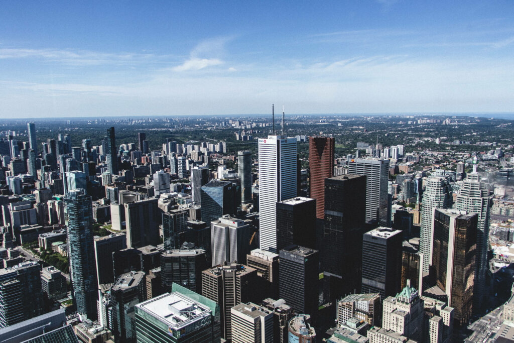 Stunning Aerial Cityscape Wallpaper: Modern Skyscrapers & Blue Sky