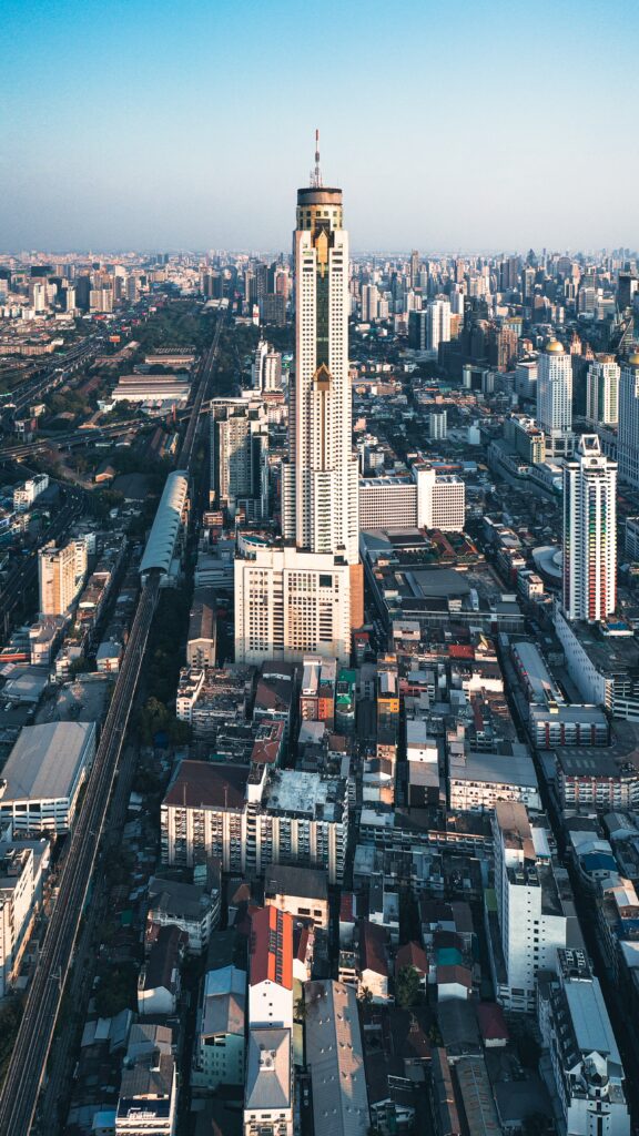 Stunning Aerial Cityscape Wallpaper with Prominent Tower