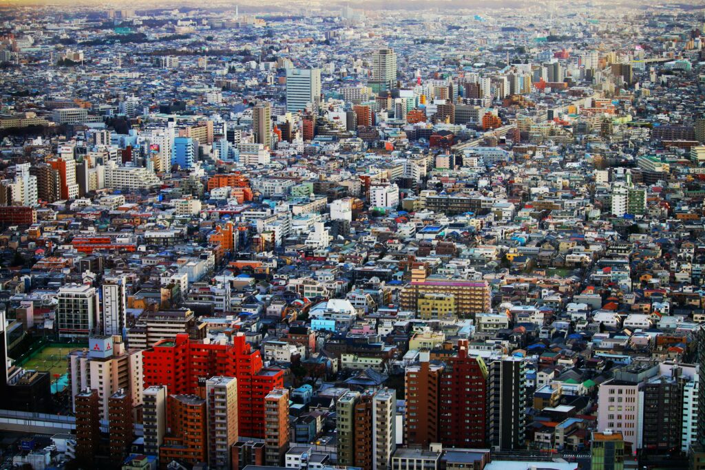Vibrant Aerial Cityscape Wallpaper: Modern Meets Traditional