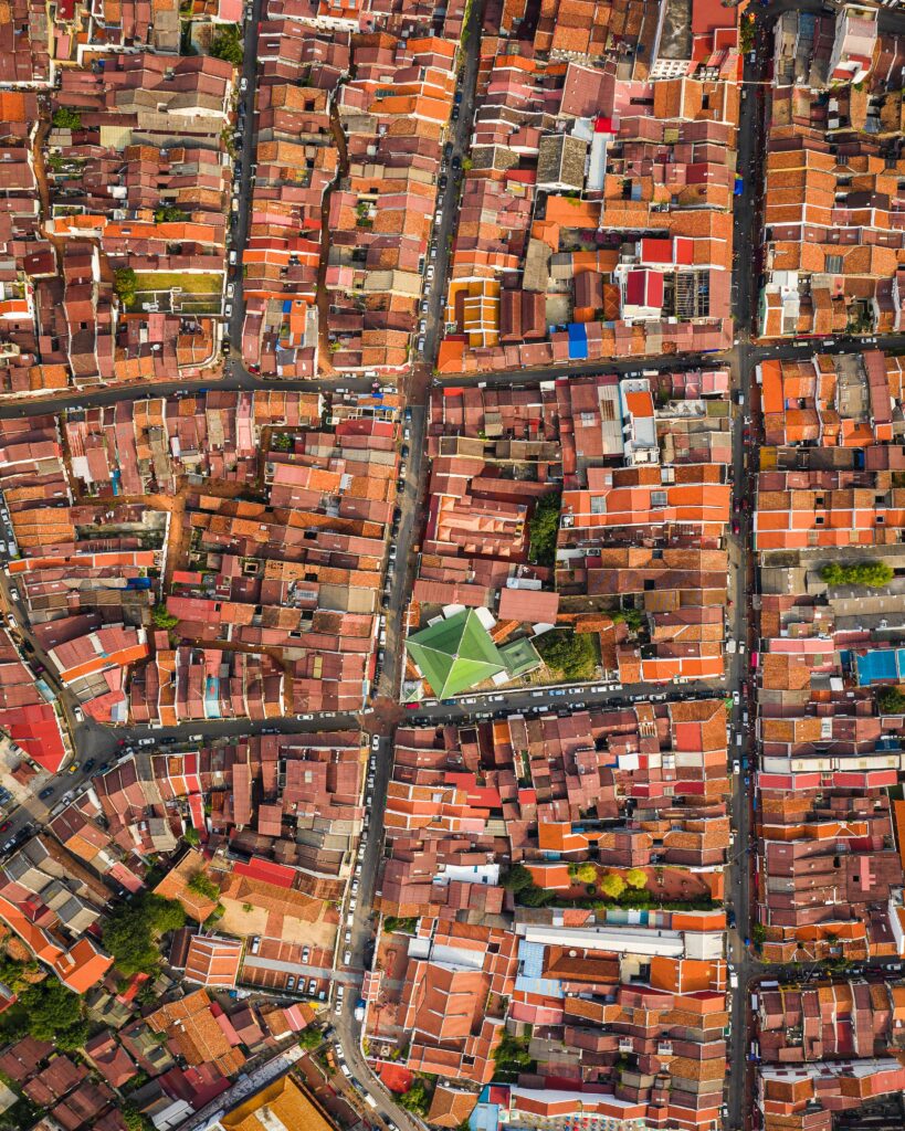 Stunning Aerial Cityscape Wallpaper: Vibrant Rooftops & Urban Patterns