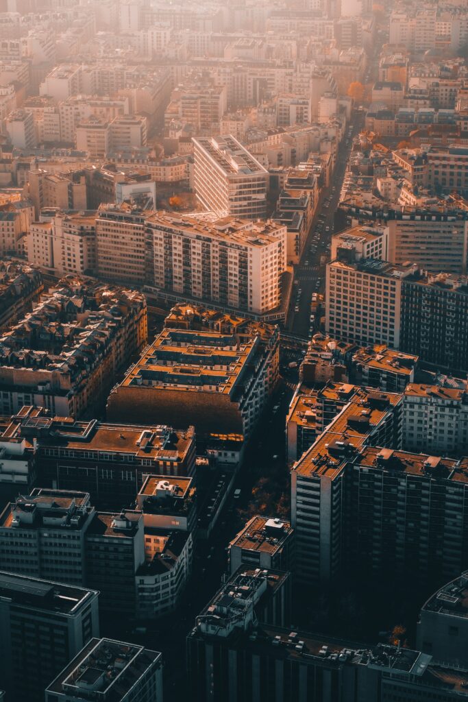 Stunning Aerial Cityscape Wallpaper: Warm Golden Sunlight