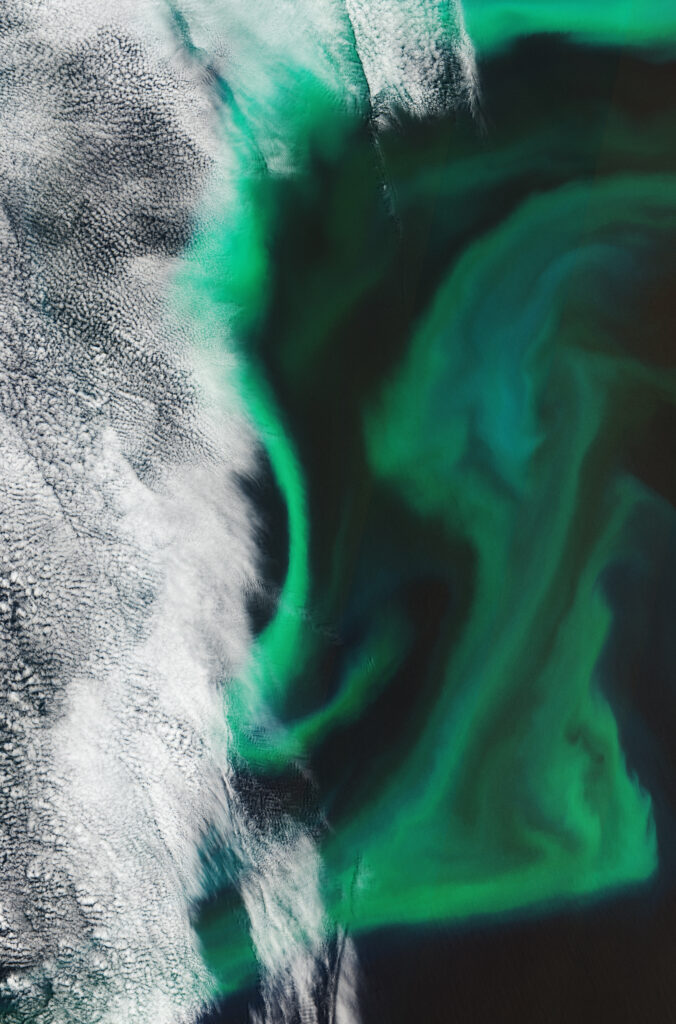 Aerial Earth Wallpaper: Mesmerizing Ocean Swirls & Clouds