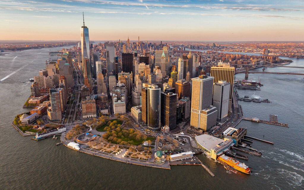 Aerial View of Manhattan: Iconic Skyscrapers & Urban Waterscape Wallpaper