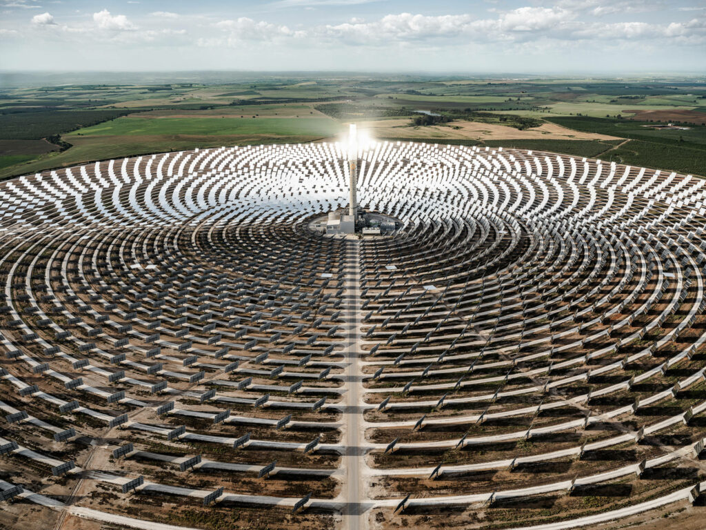 Aerial View of Circular Solar Panel System - Sustainable Wallpaper