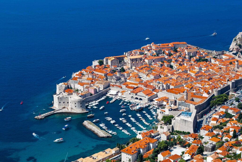 Stunning Aerial View of Dubrovnik: Historic Architecture & Blue Waters Wallpaper