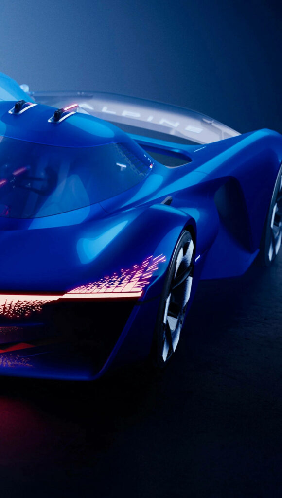 Close-up of Alpine sports car rear in vibrant blue with sleek aerodynamic design and LED taillights Wallpaper