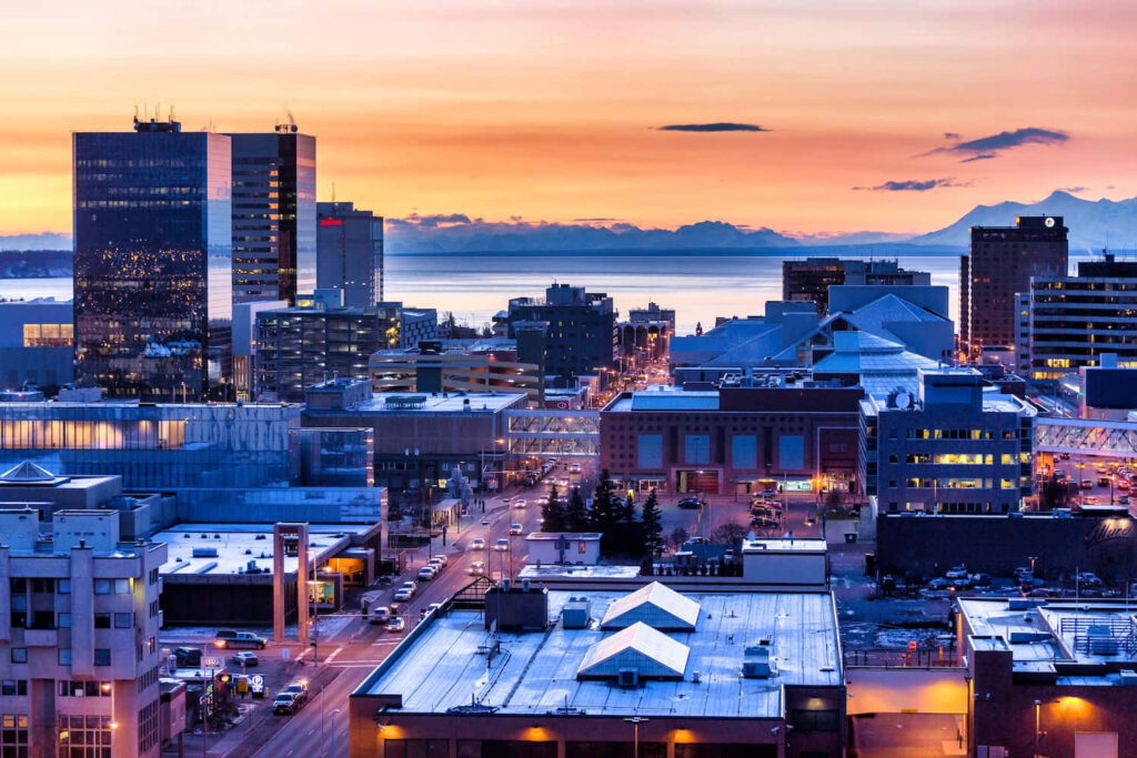 Stunning Anchorage Evening Cityscape Wallpaper: Sunset & Mountains
