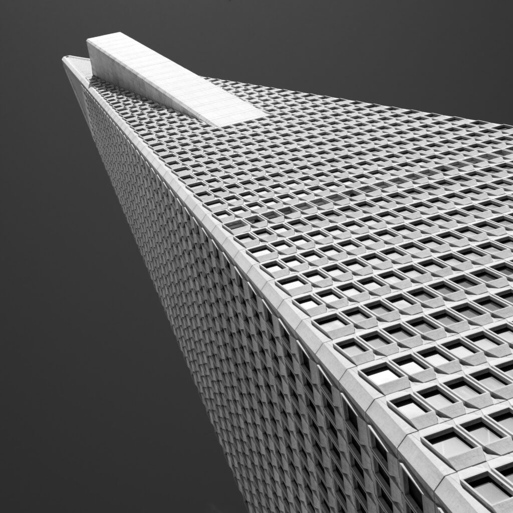 Stunning Bottom-Up View of Modern Architectural Masterpiece Wallpaper