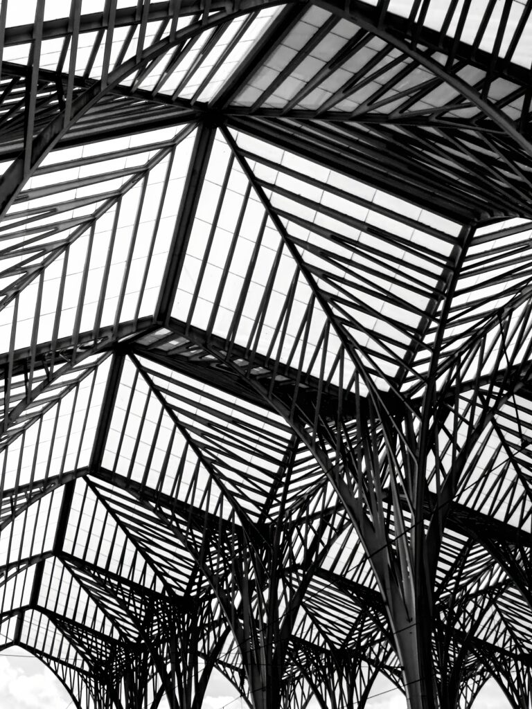 Stunning Architectural Wallpaper: Geometric Roof Design Against Sky